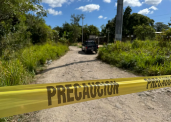 Hallan cuerpo con huellas de violencia en la SM 213